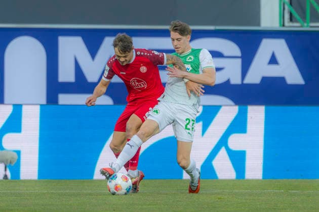 Fürth, Germany 26 May 2026 Relegation 2 BL 2025 2026 Second leg SpVgg Greuther Fürth vs Rot Weiss Essen In the picture from left in duel Jannik Hofmann RWE and Luca Itter SpVgg DFL regulations prohibit any use of photographs as image sequences and or quasi video Sportpark Ronhof Bayern Copyright: xFotostandx xSchäferx