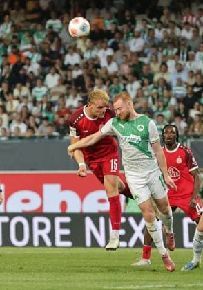 26 05 2026 Soccer season 2025 2026 Relegation 2 Soccer Bundesliga second leg SpVgg Greuther Fürth Kleeblatt Rot Weiss Essen RWE Sportfoto Zink DaMa xdaxmax DFL regulations prohibit any use of photographs as image sequences and or quasi video only for editorial use Ben Vincent Hüning 15, Rot Weiss Essen in header duel with Paul Will 13, SpVgg Greuther Fürth