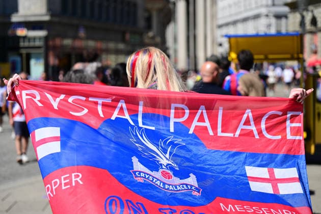 SOCCER - UEFA ECL, Crystal Palace vs Rayo Vallecano LEIPZIG,GERMANY,27.MAY.26 - SOCCER - UEFA Conference League, final, Crystal Palace FC vs Rayo Vallecano. Image shows a fan of Crystal Palace. Keywords: flag.  GEPAxpictures xMichalxFajt