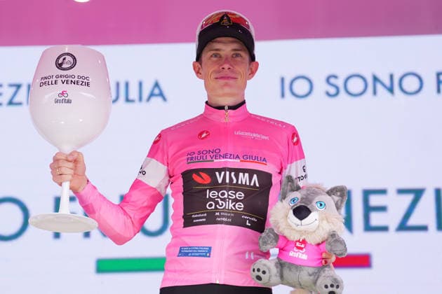 The pink jersey Denmark™s Jonas Vingegaard Hansen of Team Visma Lease A Bike celebrate on the podium after the Stage 17 of the Giro d™Italia, from Cassano d™Adda to Andalo, Italy, Wednesday, May 27, 2026.  Copyright: xSimonexSpada LaPressex