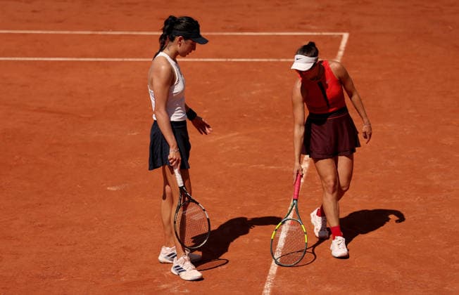 Xinyu Wang of China and Tamara Korpatsch of Germany argue a line call on the same side of the court French Open Tennis, Day Four, Tennis, Roland Garros, Paris, France - 27 May 2026Paris Roland Garros France EDITORIAL USE ONLY No use with unauthorised audio, video, data, fixture lists, club league logos or live services. Online in-match use limited to 120 images, no video emulation. No use in betting, games or single club league player publications.  Copyright: xEllaxLing Shutterstockx 16898262dx