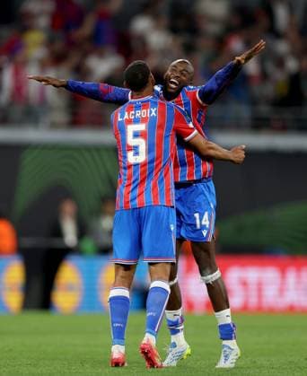Jean-Philippe Mateta of Crystal Palace (right) celebrates with teammate Maxence Lacroix winning the UEFA Conference League Crystal Palace v Rayo Vallecano, UEFA Conference League, Final, Football, Red Bull Arena, Leipzig, Germany - 27 May 2026Leipzig Red Bull Arena Germany EDITORIAL USE ONLY No use with unauthorised audio, video, data, fixture lists, club league logos or live services. Online in-match use limited to 120 images, no video emulation. No use in betting, games or single club league player publications.  Copyright: xKieranxMcManus Shutterstockx 16898266dj