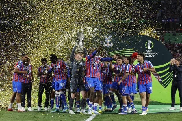 LEIPZIG - Crystal Palace FC goalkeeper Dean Henderson, Daniel Munoz of Crystal Palace FC, Tyrick Mitchell of Crystal Palace FC, Maxence Lacroix of Crystal Palace FC, IsmaÃ¯la Sarr of Crystal Palace FC, Yeremy Pino of Crystal Palace FC, Jean-Philippe Mateta of Crystal Palace FC,, Daichi Kamada of Crystal Palace FC, Adam Wharton of Crystal Palace FC, Jaydee Canvot of Crystal Palace FC, Chadi Riad of Crystal Palace FC, Crystal Palace FC goalkeeper Remi Matthews, Crystal Palace FC goalkeeper Walter Benitez, Jefferson Lerma of Crystal Palace FC, Brennan Johnson of Crystal Palace FC, Nathaniel Clyne of Crystal Palace FC, Will Hughes of Crystal Palace FC, Jorgen Strand Larsen of Crystal Palace FC, Borna Sosa of Crystal Palace FC, Chris Richards of Crystal Palace FC, Evann Guessand of Crystal Palace FC, Justin Devenny of Crystal Palace FC, Rio Cardines of Crystal Palace FC, Crystal Palace FC coach Oliver Glasner, Dean Benamar of Crystal Palace FC, Ben Casey of Crystal Palace FC, George King of Crystal Palace FC with the UEFA Europa Conference League trophy during the UEFA Conference League Final between Crystal Palace FC and Rayo Vallecano de Madrid at the Leipzig Arena on May 27, 2026 in Leipzig, Germany. MAURICE VAN STEEN ANP UEFA Conference League - FINAL 2025-2026 xVIxANPxSportx xMauricexvanxSteenxIVx 559470434 originalFilename: 559470434.jpg