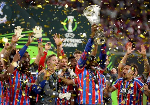 Jean-Philippe Mateta of Crystal Palace celebrates with the trophy after winning the UEFA Conference League Crystal Palace v Rayo Vallecano, UEFA Conference League, Final, Football, Red Bull Arena, Leipzig, Germany - 27 May 2026Leipzig Red Bull Arena Germany EDITORIAL USE ONLY No use with unauthorised audio, video, data, fixture lists, club league logos or live services. Online in-match use limited to 120 images, no video emulation. No use in betting, games or single club league player publications.  Copyright: xKieranxMcManus Shutterstockx 16898266dy