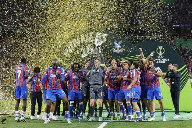 LEIPZIG - Crystal Palace FC goalkeeper Dean Henderson, Daniel Munoz of Crystal Palace FC, Tyrick Mitchell of Crystal Palace FC, Maxence Lacroix of Crystal Palace FC, IsmaÃ¯la Sarr of Crystal Palace FC, Yeremy Pino of Crystal Palace FC, Jean-Philippe Mateta of Crystal Palace FC,, Daichi Kamada of Crystal Palace FC, Adam Wharton of Crystal Palace FC, Jaydee Canvot of Crystal Palace FC, Chadi Riad of Crystal Palace FC, Crystal Palace FC goalkeeper Remi Matthews, Crystal Palace FC goalkeeper Walter Benitez, Jefferson Lerma of Crystal Palace FC, Brennan Johnson of Crystal Palace FC, Nathaniel Clyne of Crystal Palace FC, Will Hughes of Crystal Palace FC, Jorgen Strand Larsen of Crystal Palace FC, Borna Sosa of Crystal Palace FC, Chris Richards of Crystal Palace FC, Evann Guessand of Crystal Palace FC, Justin Devenny of Crystal Palace FC, Rio Cardines of Crystal Palace FC, Crystal Palace FC coach Oliver Glasner, Dean Benamar of Crystal Palace FC, Ben Casey of Crystal Palace FC, George King of Crystal Palace FC with the UEFA Europa Conference League trophy during the UEFA Conference League Final between Crystal Palace FC and Rayo Vallecano de Madrid at the Leipzig Arena on May 27, 2026 in Leipzig, Germany. MAURICE VAN STEEN ANP UEFA Conference League - FINAL 2025-2026 xVIxANPxSportx xMauricexvanxSteenxIVx 559471741 originalFilename: 559471741.jpg