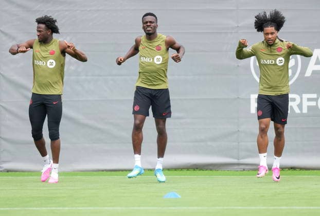 May 27, 2026, Charlotte, Nc, UNITED STATES: Canada teammates IsmaoÂ«l Kono , left, Tani Oluwaseyi, centre, and Jayden Nelson stretch during Team Canada World Cup roster selection camp in Charlotte, N.C., on Wednesday, May 27, 2026. Canada News - May 27, 2026  - ZUMAc35_ 20260527_zaf_c35_192 Copyright: xNathanxDenettex