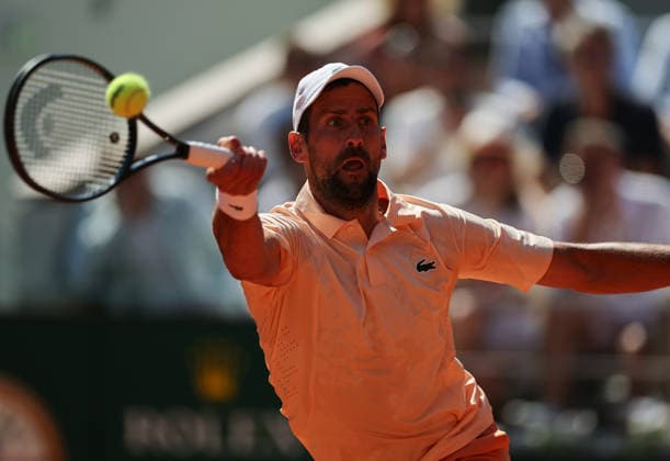(260527) -- PARIS, May 27, 2026 -- Novak Djokovic hits a return during the men s singles second round match between Novak Djokovic of Serbia and Valentin Royer of France at the French Open tennis tournament at Roland Garros, Paris, France, May 27, 2026. ) (SP)FRANCE-PARIS-TENNIS-FRENCH OPEN-MEN S SINGLES-2ND ROUND-NOVAK DJOKOVIC VS VALENTIN ROYER WuxHuiwo 