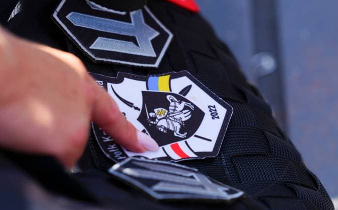 Oleksandra Oliynykova describes the patches on her bag including the red and white striped flag of the historical Belarusian Democratic Republic, and used by the country s opposition against Alexander Lukashenko in more recent protests French Open Tennis, Day Five, Tennis, Roland Garros, Paris, France - 28 May 2026Paris Roland Garros France EDITORIAL USE ONLY No use with unauthorised audio, video, data, fixture lists, club league logos or live services. Online in-match use limited to 120 images, no video emulation. No use in betting, games or single club league player publications.  Copyright: xJavierxGarcia Shutterstockx 16898263g