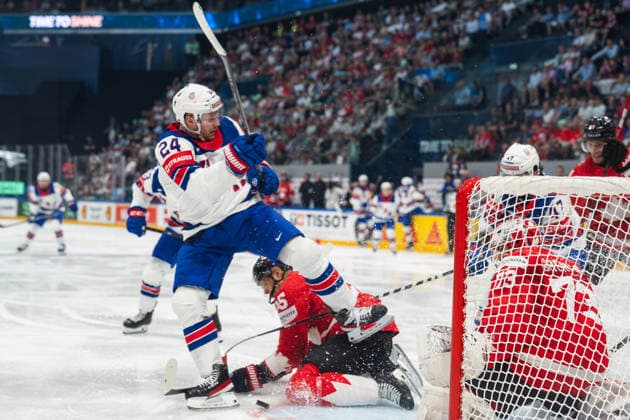 FRIBOURG, FRIBOURG - MAY 28: Mathieu Olivier of the United States battles with Darnell Nurse of Canada during the 2026 IIHF World Championship, WM, Weltmeisterschaft quarterfinal match between Canada and the United States at BCF Arena on May 28, 2026 in Fribourg, Fribourg, Switzerland. Copyright: xLivioxBaeriswylx xSPPx Sportspressphoto_SPR156145