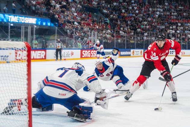 FRIBOURG, FRIBOURG - MAY 28: Porter Martone of Canada attempts a shot during the 2026 IIHF World Championship, WM, Weltmeisterschaft quarterfinal match between Canada and the United States at BCF Arena on May 28, 2026 in Fribourg, Fribourg, Switzerland. Copyright: xLivioxBaeriswylx xSPPx Sportspressphoto_SPR156196