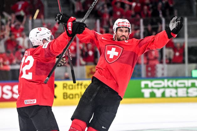 ZURICH, SWITZERLAND MAY 28 Roman Josi of Switzerland R celebrates his goal with Denis Malgin of Switzerland L during the 2026 IIHF Ice Hockey World Championship Switzerland game between Switzerland and Sweden at Swiss Life Arena on May 28, 2026 in Zurich, Zurich Zurich Swiss Life Arena Zurich Switzerland Copyright: xJustPictures.ch AndreaxBrancax jp-en-EuSpIm-JP7_ANB_FinCze_28052026_2036