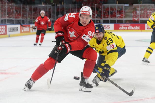 28 05 2026 Swiss Life Arena Zurich , SWITZERLAND, Mens Ice Hockey IIHF World Championship Zurich 2026 Quarterfinal SUI SWE Attilio Biasca li,SUI against Oliver Ekman Larsson SWE