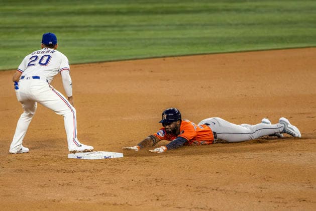 May 28, 2026, Arlington, Texas, USA: Houston Astros center fielder TAYLOR TRAMMELL (26) slides into second for a double during a MLB, Baseball Herren, USA game between the Houston Astros and Texas Rangers at Globe Life Field. Houston wins 5-1. Arlington USA - ZUMAf180 20260528_zsp_f180_005 Copyright: xMarkxFannx