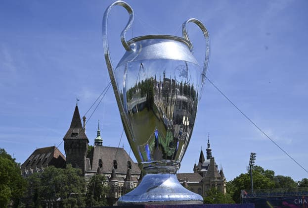 Ahead of the UEFA Champions League final in Budapest BUDAPEST, HUNGARY - MAY 29: The huge UEFA Champions League trophy is seen as English football club Arsenal and French side Paris Saint-Germain fans gather at the fan zone set up in the city center to spend time in experience areas ahead of the UEFA Champions League final match in Budapest, Hungary, on May 29, 2026. Halil Sagirkaya Anadolu Budapest Hungary. Editorial use only. Please get in touch for any other usage.  Copyright: x2026xAnadoluxHalilxSagirkayax