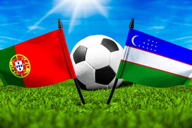 FOTOMONTAGE, Fußball-Weltmeisterschaft 2026: Nationalflaggen von Portugal und Usbekistan mit Fußball auf Rasen. Symbolbild zum WM-Gruppenspiel am 23 Juni bei der FIFA Fussball-Weltmeisterschaft 2026