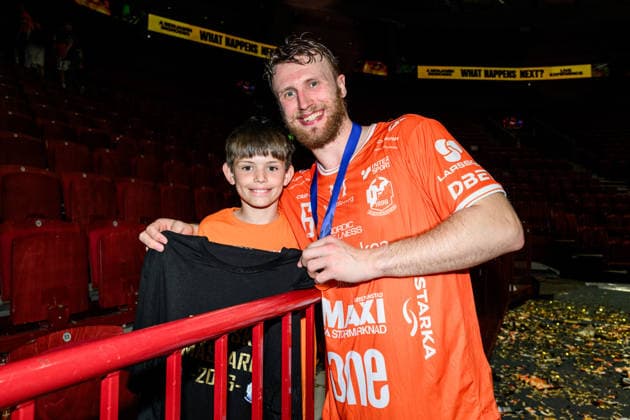260529 IFK Kristianstads Philip Henningsson with supporter after final four in the Mens Handball League between HK Malmö and IFK Kristianstad on May 29, 2026 in Malmö  Copyright: MATHILDAxSCHULER BB260529MA126