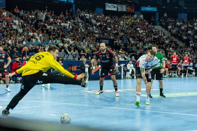 Emil Jakobsen SG Flensburg Handewitt controls the ball during the handball semi final of the Winamax EHF Finals 2026 between MT Melsungen and SG Flensburg Handewitt at Barclays Arena on May 30, 2026 in Hamburg, Germany