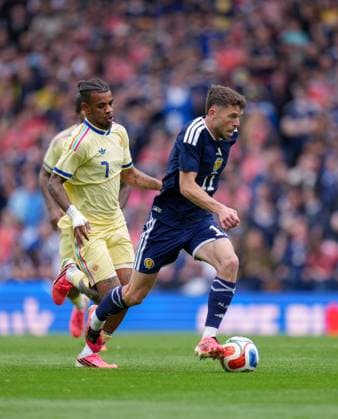 Ryan Christie of Scotland chased by Juninho Bacuna of Curacao Scotland v Curacao, International Friendly, Länderspiel, Nationalmannschaft Football, Hampden Park, Glasgow, Scotland, UK - 30 May 2026Glasgow Hampden Park United Kingdom EDITORIAL USE ONLY No use with unauthorised audio, video, data, fixture lists, club league logos or live services. Online in-match use limited to 120 images, no video emulation. No use in betting, games or single club league player publications.  Copyright: xStuartxWallace Shutterstockx 16898283aj