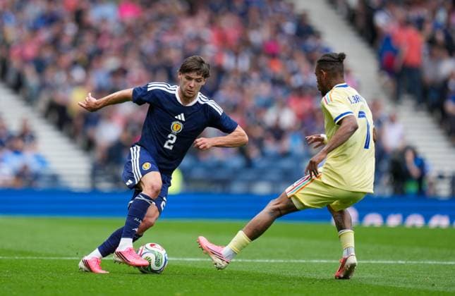 Aaron Hickey of Scotland & Juninho Bacuna of Curacao Scotland v Curacao, International Friendly, Länderspiel, Nationalmannschaft Football, Hampden Park, Glasgow, Scotland, UK - 30 May 2026Glasgow Hampden Park United Kingdom EDITORIAL USE ONLY No use with unauthorised audio, video, data, fixture lists, club league logos or live services. Online in-match use limited to 120 images, no video emulation. No use in betting, games or single club league player publications.  Copyright: xStuartxWallace Shutterstockx 16898283ap