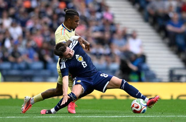 Glasgow, Scotland, 30th May 2026. Juninho Bacuna of Curacao and Billy Gilmour of Scotland during the Scotland vs Curacao International Friendly, Länderspiel, Nationalmannschaft match at Hampden Park, Glasgow. Picture credit should read: Neil Hanna Sportimage EDITORIAL USE ONLY. No use with unauthorised audio, video, data, fixture lists, club league logos or live services. Online in-match use limited to 120 images, no video emulation. No use in betting, games or single club league player publications. SPI_081_NH_Scotland_Curacao SPI-4830-0081