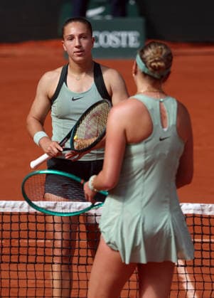 French Diane Parry and US Amanda Anisimova (RÂ° shake hands at the end of their third-round match at the French Tennis Open in Roland Garros in Paris, France, on Saturday, May 30, 2026. Parry won 6-3, 4-6, 7-6.  PAR20260530126 MAYAxVIDON-WHITE