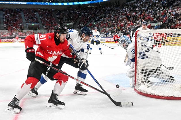 ZURICH, SWITZERLAND MAY 30 Dylan Holloway of Canada in action against Hannes Bjorninen of Finland L and goalkeeper Justus Annunen of Finland during the 2026 IIHF Ice Hockey World Championship Switzerland game between Canada and Finland at Swiss Life Arena on May 30, 2026 in Zurich, Zurich Zurich Swiss Life Arena Zurich Switzerland Switzerland Copyright: xJustPictures.ch AndreaxBrancax jp-en-EuSpIm-JP7_ANB_FinCze_30052026_7603