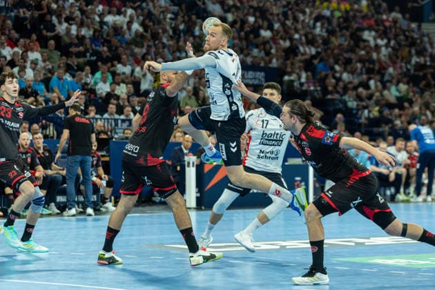 Simon Pytlick SG Flensburg Handewitt controls the ball during the handball semi final of the Winamax EHF Finals 2026 between MT Melsungen and SG Flensburg Handewitt at Barclays Arena on May 30, 2026 in Hamburg, Germany