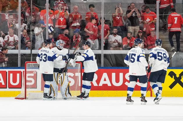 xxkeikkaxx 20260530 Swiss Life Arena, Zurich, Switzerland. IIHF Ice hockey, Eishockey World Championships Semifinal match Canada vs Finland Nikolas Matinpalo (33) and Olli Määttä (3) of Team Finland head in to congratulate Justus Annunen (31) after defeating Team Canada. Photo by Pasi Suokko All Over Press  1.06241338