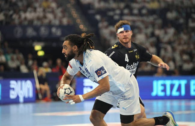 photo on the ball Hugo Bryan MONTE dos SANTOS Montpellier against Johannes Golla Flensburg Handball Men on Sun 31 05 2026 Mens EHF European League , Final Four in Hamburg SG Flensburg Montpellier HB Match for 3rd place
