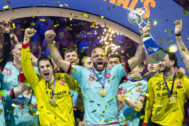 Goalkeeper Nebojsa Simic MT Melsungen , Adrian Sipos MT Melsungen and goalkeeper Pawel Krawczyk MT Melsungen with the Trophy during the handball final of the Winamax EHF Finals 2026 between THW Kiel and MT Melsungen at Barclays Arena on May 31, 2026 in Hamburg, Germany