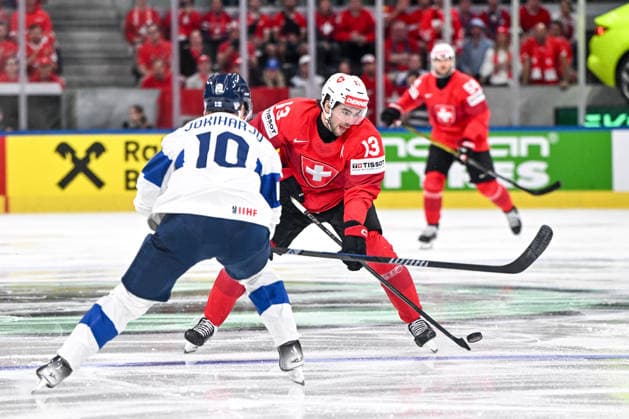ZURICH, SWITZERLAND MAY 31 Nico Hischier of Switzerland in action against Henri Jokiharju of Finland during the 2026 IIHF Ice Hockey World Championship Switzerland Gold Medal game between Switzerland and Finland at Swiss Life Arena on May 31, 2026 in Zurich, Zurich Zurich Swiss Life Arena Zurich Switzerland Copyright: xJustPictures.ch AndreaxBrancax jp-en-EuSpIm-JP7_ANB_SuiFin_31052026_8599
