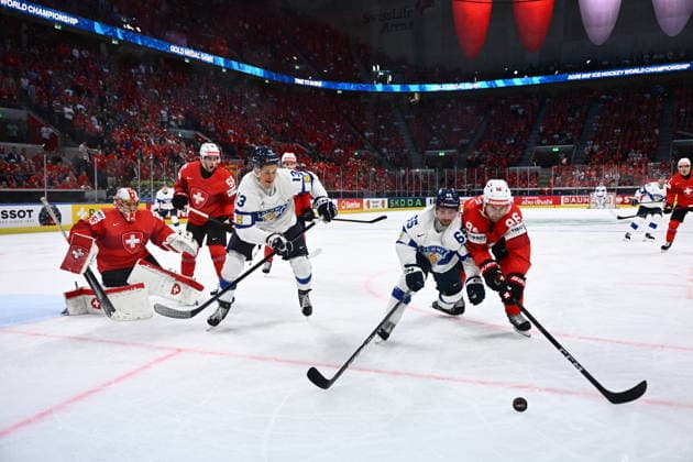 Sakari Manninen of Finland and Janis Moser of Switzerland in action during the final match Switzerland vs Finland at the 2026 IIHF Ice hockey, Eishockey World Championship, WM, Weltmeisterschaft in Zurich, Switzerland, May 31, 2026. (CTKxPhoto RadekxPetrasek) CTKPhotoP2026053105857  CTKPhotoP2026053105857
