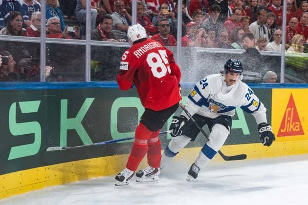 ZURICH, ZURICH - MAY 31: Sven Andrighetto of Switzerland battles with Hannes Bjorninen of Finland during the Gold Medal Game between Switzerland and Finland of the 2026 IIHF World Championship, WM, Weltmeisterschaft at Swiss Life Arena on May 31, 2026 in Zurich, Zurich, Switzerland. Copyright: xLivioxBaeriswylx xSPPx Sportspressphoto_SPR158154