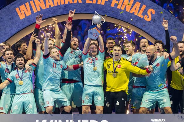 Timo Kastening MT Melsungen lifts the EHF Cup at the award ceremony during the handball final of the Winamax EHF Finals 2026 between THW Kiel and MT Melsungen at Barclays Arena on May 31, 2026 in Hamburg, Germany