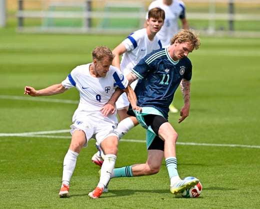 01 06 2026, Football, DFB national team Germany, last training session before departure to the USA for the 2026 World Cup, at the DFB Campus in Frankfurt am Main f l Santeri Väänänen Finland against Nick Woltemade Germany