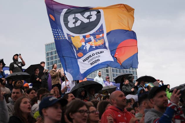June 1, 2026, Warsaw, Masovian Voivodeship, Poland: A person in the stands waves a giant tournament flag during a FIBA 3x3 Basketball World Cup womenÃ¢â‚¬â ¢s Pool A game between Poland and Madagascar in Warsaw, Poland. Warsaw Poland - ZUMAk204 20260601_zip_k204_074 Copyright: xRomanxKozielx