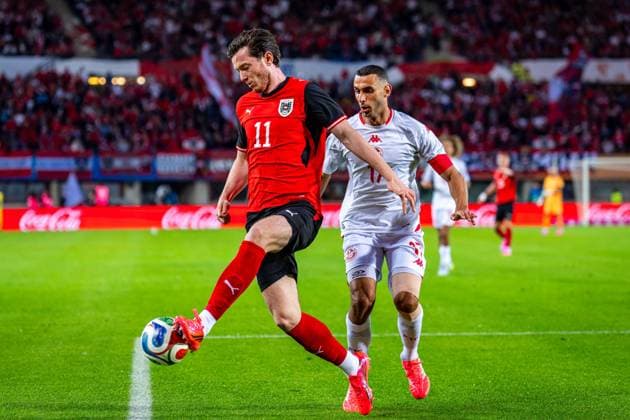 SOCCER - AUT vs TUN, test match VIENNA,AUSTRIA,01.JUN.26 - SOCCER - OEFB international test match, Austria vs Tunisia. Image shows Michael Gregoritsch (AUT) and Ellyes Skhiri (TUN).  GEPAxpictures xKevinxHackner