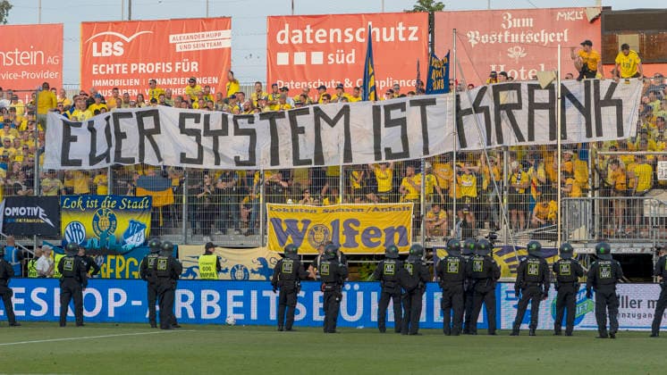 ans of 1 FC Lok Leipzig protest with a banner against the promotion modalities to the 3 Liga The banner bears the inscription Your system is sick and thus criticizes the current playoff system between the regional league champions, AKON Arena am Dallenberg, Würzburg, Germany, on 1 June 2026 DFB DFL REGULATIONS PROHIBIT ANY USE OF PHOTOGRAPHS AS IMAGE SEQUENCES AND OR QUASI VIDEO, Copyright: HMBxMedia xHeikoxBecker
