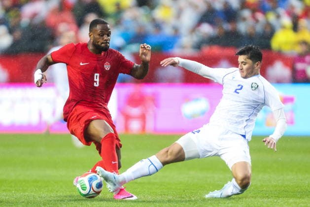 June 1, 2026, Edmonton, Ab, CANADA: Canada s Cyle Larin (9) has the ball kicked away by Uzbekistan s Abdukodir Khusanov (2) during first half World Cup Friendly soccer action in Edmonton on Monday, June 1, 2026. Canada News - June 1, 2026  - ZUMAc35_ 20260601_zaf_c35_089 Copyright: xCodiexMclachlanx