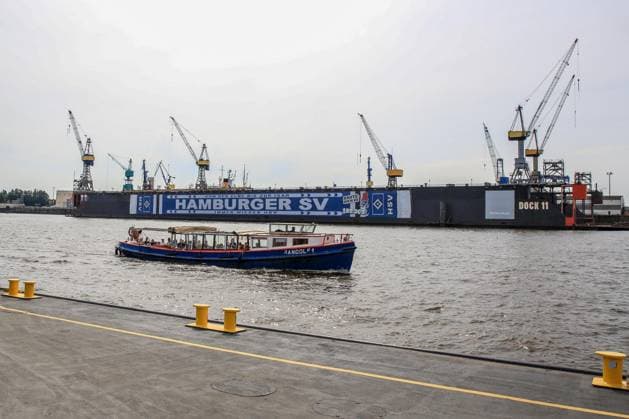 HSV celebrates over 150000 members with an oversized HSV scarf at Dock 11 in Hamburg harbor ship barge Randolf 1 Germany , Hamburg , harbor , fish market , football , 1 Bundesliga , Hamburger SV HSV