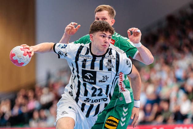 L R Rasmus Ankermann THW Kiel, 22 in duel with Karolis Antanavicius GWD Minden, 08 GER, GWD Minden vs THW Kiel, Handball, 1 Bundesliga, Matchday 33, Season 2025 2026, 03 06 2026 GER, GWD Minden vs THW Kiel, Handball, 1 Bundesliga, Matchday 33, Season 2025 2026, 03 06 2026 Minden Copyright: xEibner-Pressefoto JanxRollingerx EP_JSK