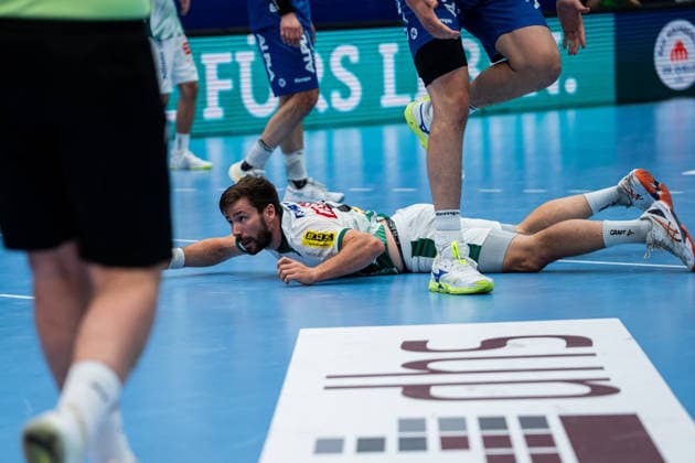 TBV Lemgo Lippe GER vs SC DHfK Leipzig GER , Handball, Daikin Handball Bundesliga, 33 Matchday, 3 6 2026, Season 2025 2026, Lemgo Lukas Binder SC DHfK Leipzig, 11 lies on the floor, complains Lemgo Phoenix Contact Arena Germany