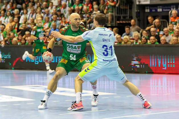 03 06 2026, xgox, Handball Daikin HBL SC Magdeburg VfL Gummersbach emspor, v l Oscar Bergendahl Magdeburg, 54 , Kay Smits Gummersbach, 31 duel, duel, fight, tackle Magdeburg