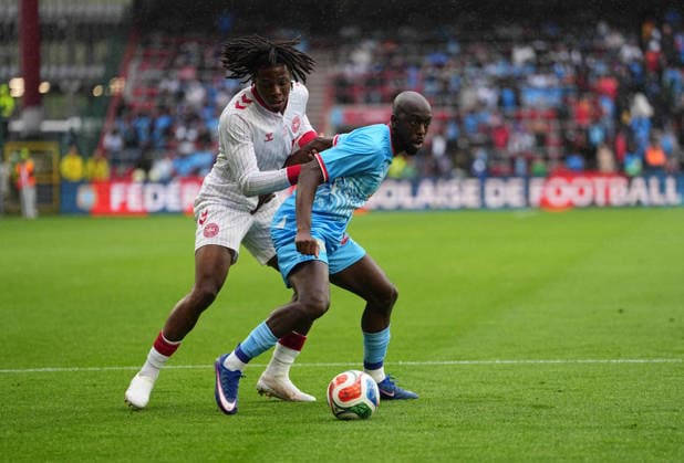 Patrick Dorgu Denmark and Yoane Wissa DR Congo battle for the ball during DR Congo and Denmark, UEFA International Friendly, Stade Maurice Dufrasne, Liege, Belgium on June 3, 2026 Thor Wegner DeFodi Images Photo by DeFodi Images