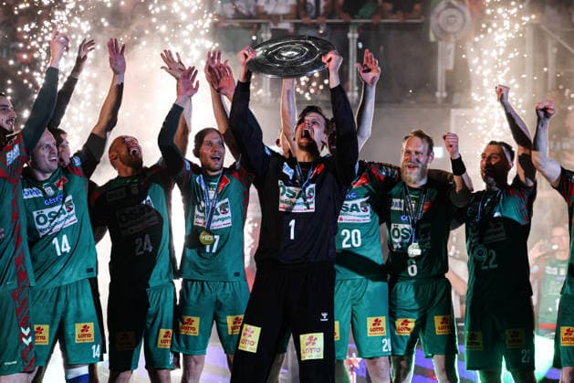 Goalkeeper Sergey Hernandez Ferrer SC Magdeburg,1 with the championship trophy Handball Bundesliga season 2025 2026 SC Magdeburg vs VfL Gummersbach at the GETEC Arena in Magdeburg Action,Handball,Germany,03 06 2026