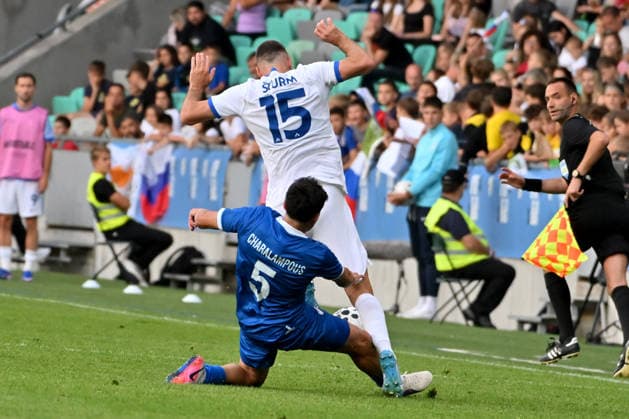 LJUBLJANA, SLOVENIA - JUNE 04: Charalampos Charalampous of Cyprus (L) in action against Danijel Sturm of Slovenia (R) during the International men?s football Friendly match between Slovenia and Cyprus at Stadium Stozice, Ljubljana on June 04, 2026 in Ljubljana, Slovenia. (Photo by Igor Kupljenik Sports Press Photo). Copyright: xIgorxKupljenikx xSPPx Sportspressphoto_SPR160742