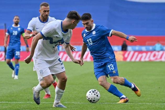LJUBLJANA, SLOVENIA - JUNE 04: Ioannis Costi of Cyprus (R) in action against Srdjan Kuzmic of Slovenia (L) during the International men?s football Friendly match between Slovenia and Cyprus at Stadium Stozice, Ljubljana on June 04, 2026 in Ljubljana, Slovenia. (Photo by Igor Kupljenik Sports Press Photo). Copyright: xIgorxKupljenikx xSPPx Sportspressphoto_SPR160744
