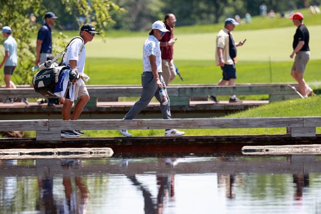 Memorial Tournament presented by Workday DUBLIN, OH - JUNE 04: Rickie Fowler of Murrieta,California walks with his caddie in the bridge to the 9th green during the first round of the Memorial Tournament presented by Workday at Muirfield Village Golf Club on June 4, 2026 in Dublin, Ohio. Dublin Ohio United States  Copyright: xAmyxLemusx originalFilename:lemus-memorial260604_npGrI.jpg