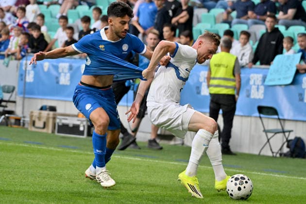 LJUBLJANA, SLOVENIA - JUNE 04: Zan Karnicnik of Slovenia (R) in action against Giorgos Naoum of Cyprus (L) during the International men?s football Friendly match between Slovenia and Cyprus at Stadium Stozice, Ljubljana on June 04, 2026 in Ljubljana, Slovenia. (Photo by Igor Kupljenik Sports Press Photo). Copyright: xIgorxKupljenikx xSPPx Sportspressphoto_SPR160763