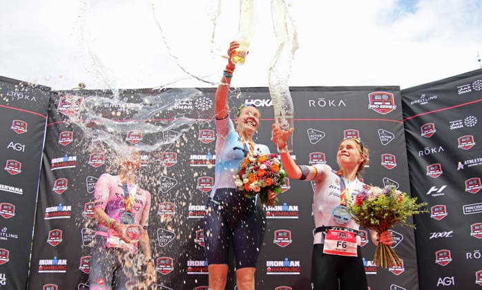 Ironman in Hamburg 2026 Beer shower after the award ceremony Norways Solveig Lövseth m wins the European Championship title Laura Philipp l Germany comes second, bronze goes to Denmarks Katrine Christensen r